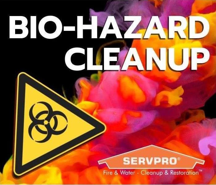 Colorful red and orange smoke background with biohazard symbol and SERVPRO house logo.